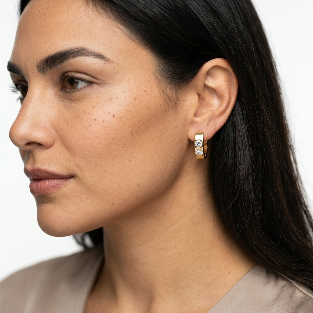 Huggie hoop earrings — On Model - Close-up Detail | Generated by Modelize