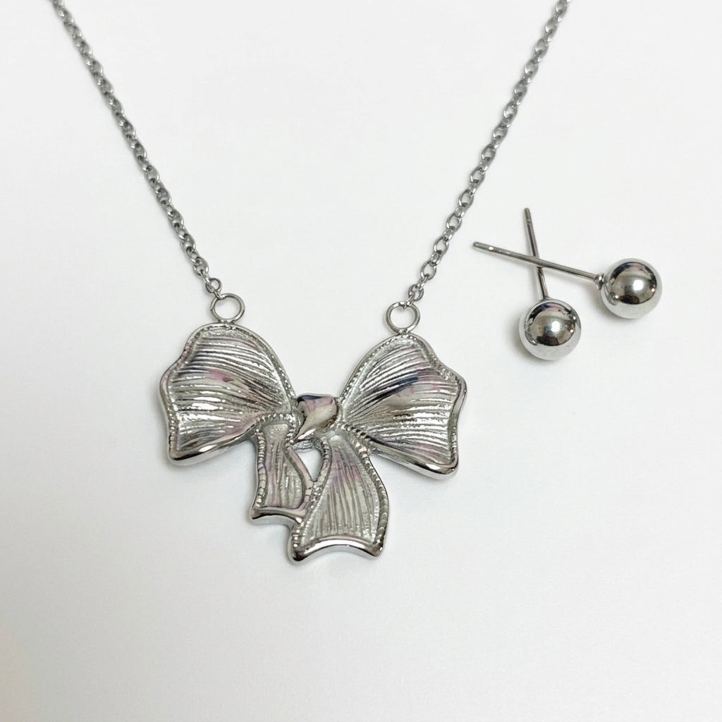 Jewelry Set (Necklace and Earrings) — Clean Studio | Generated by Modelize