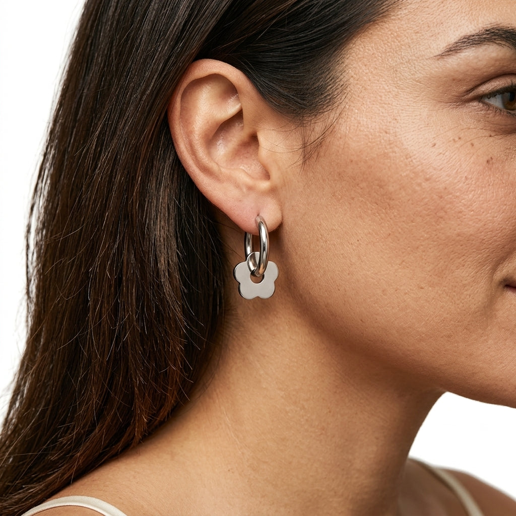 Huggies Earrings with charm — On Model - Close-up Detail | Generated by Modelize
